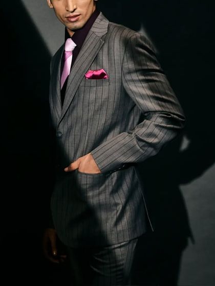 This is your perfect formal look, a two-button coat with pants, shirt, tie, and pocket square, all customizable at Manhar.