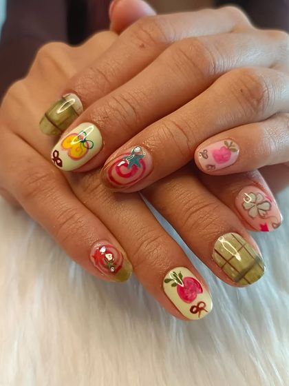 Another view of the eclectic, multi-design nail art set inspired by another artist.