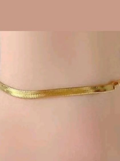 My classic flat snake chain anklet. It's a simple, elegant design that is guaranteed to hold its gold-tone color.