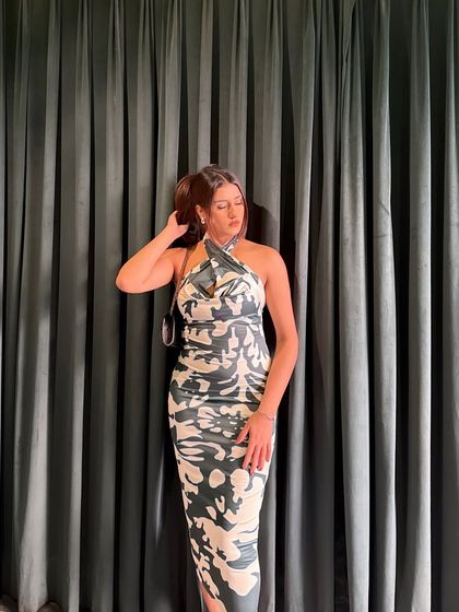 A candid moment, adjusting my ponytail.