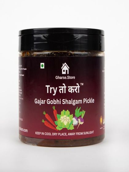 A medium jar of Gajar Gobhi Shalgam Pickle on a white background.