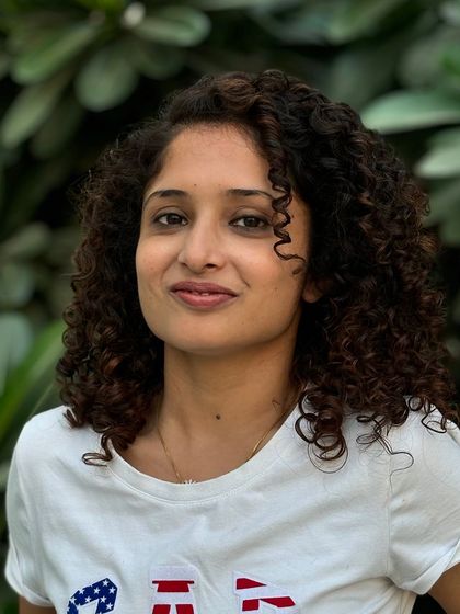 A close-up on the curl definition. My techniques ensure that the coloring process enhances, rather than damages, your natural texture.