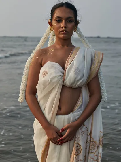 Stepping into the sea at dusk, we created this conceptual portrait. It’s an example of how I love to push creative boundaries, blending traditional elements with an artistic vision to produce something truly unique and evocative.
