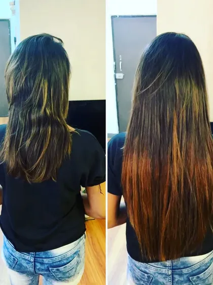 Here, we blended extensions with her natural hair, which had some existing color. The result is a longer, fuller style with a seamless transition and a healthy, straight finish.