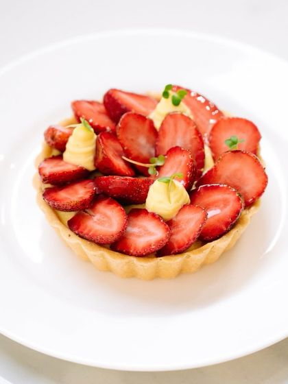 A beautiful strawberry and crème pâtissière tart, made to celebrate Valentine's Day. We use the freshest seasonal berries to create this delightful dessert.
