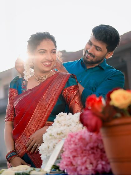 A close-up of a tender moment, with beautiful backlighting from the sun creating a halo effect.