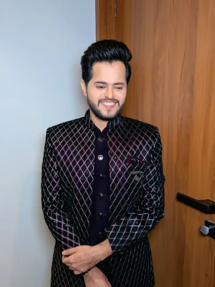 Another candid moment. The grooming is designed to look good from all angles, whether in a formal portrait or a spontaneous shot.