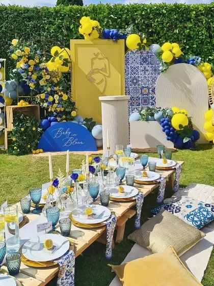 A vibrant and chic baby shower with a unique lemon and royal blue theme. This outdoor picnic setup shows our love for creative color palettes and detailed tablescaping, creating a joyful and aesthetic atmosphere for the mom-to-be.
