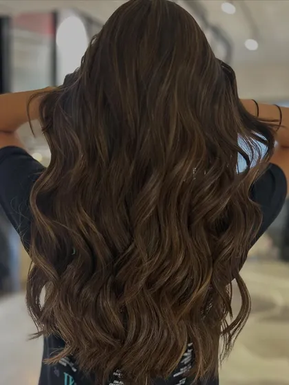 A two-tone balayage blend for a first-time color client. The result is a beautiful, subtle enhancement that will grow out gracefully.
