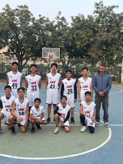 Our U-15 boys' team and their coaches, ready for their tournament. We build strong, cohesive teams.