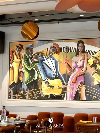 This view shows how the jazz mural integrates with the restaurant's seating, becoming an integral part of the dining atmosphere.
