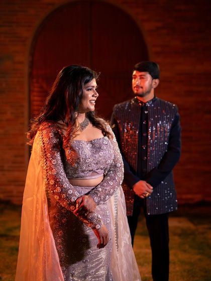 A candid moment of laughter between Yeshaswini and Shashank. We designed a boho-chic backdrop with cane lanterns and birds of paradise that perfectly matched their relaxed and happy vibe.