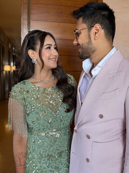 A lovely couple portrait from the Welcome Lunch. The bride's soft, natural makeup looks beautiful next to her partner, creating a harmonious and picture-perfect moment.