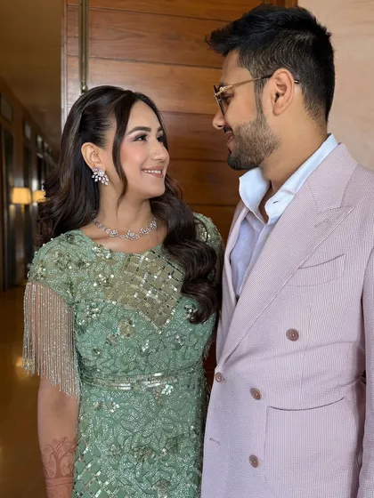 A lovely couple portrait from the Welcome Lunch. The bride's soft, natural makeup looks beautiful next to her partner, creating a harmonious and picture-perfect moment.
