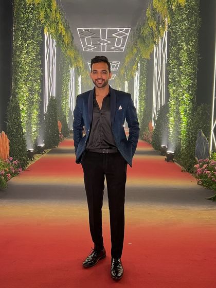 Ready to hit the stage. This photo was taken right before hosting a large corporate gala, showing the impressive setup with a red carpet entrance that we created for the guests.