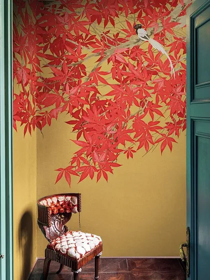 This corner features a stunning artistic wall painting. Such elements can calm your mind and add a unique, personal touch to any drawing room or entryway.