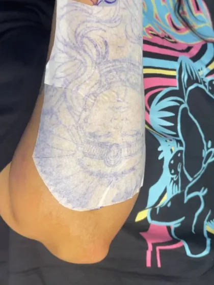 The stencil for the illustrative forearm tattoo, ready for application. A clean stencil is the foundation of a great tattoo.