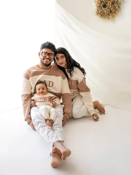 The perfect family huddle. I love using a minimalist setup in my studio for family portraits that feel modern, authentic, and full of warmth.