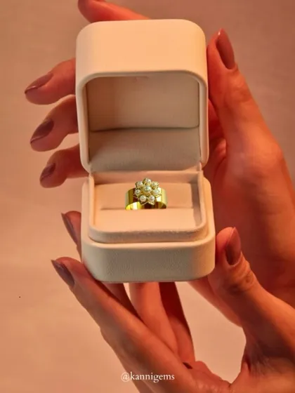 As delicate as a flower, yet as enduring as time. This ring, crafted in pure gold with a cluster of luminous pearls, is a quiet celebration of beauty that never fades.