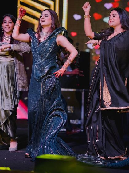 The bride leading her squad in a powerful performance. I choreograph routines that make the bride the star while letting her friends shine with her.