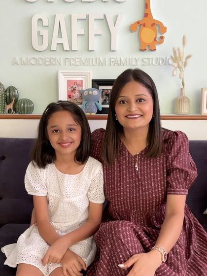 A sweet mother-daughter portrait taken on our studio couch.