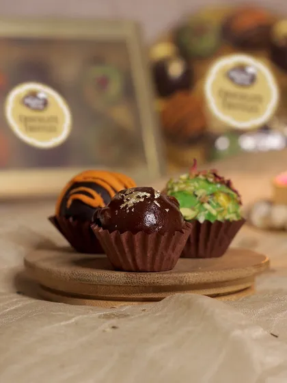 Another view of our assorted chocolate truffles, showcasing the variety and beautiful presentation.