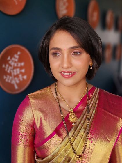 An absolutely subtle and modern look for a client with short hair, proving that you can have a gorgeous traditional look with any hairstyle.