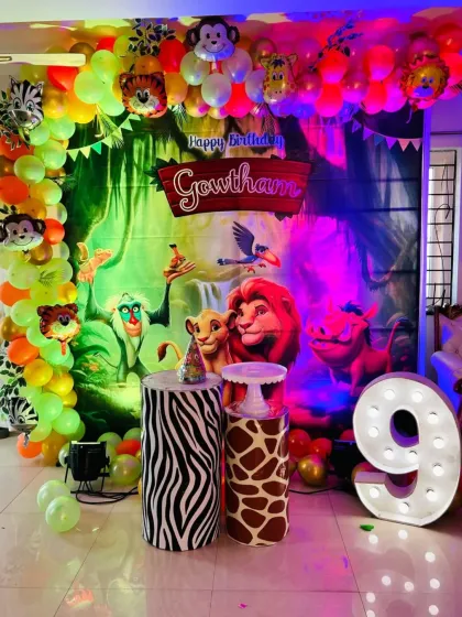 Different lighting on the Lion King setup, creating a more dramatic, evening party feel.