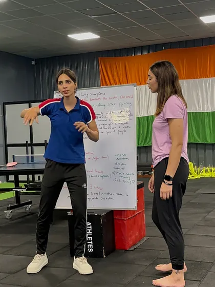 Spreading awareness and knowledge is part of our culture. Here, an athlete leads a workshop on mental preparation and focus.