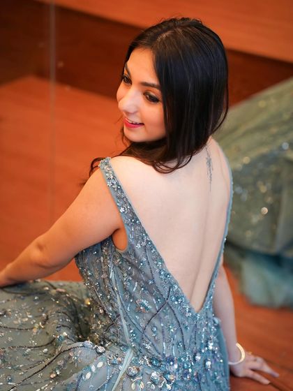 A back view of the grey gown, showing the deep-V back and the detailed sequin work. I always make sure to capture every angle of the outfit.