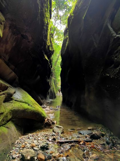 Another perspective of the Himalayan slot canyon, showing the narrow path carved by the stream.