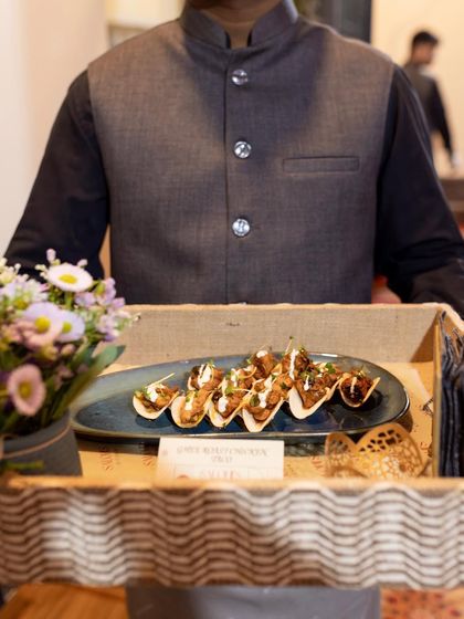 A tray of my signature Chicken Ghee Roast Tacos, elegantly presented and ready to be served.