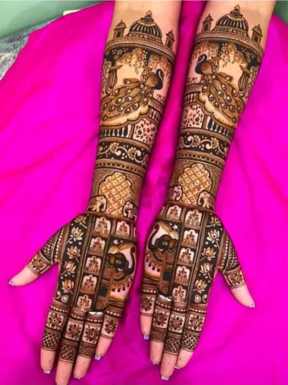 This intricate design combines the beauty of peacocks at the top of the arm with detailed grid patterns and lotus motifs on the hands.