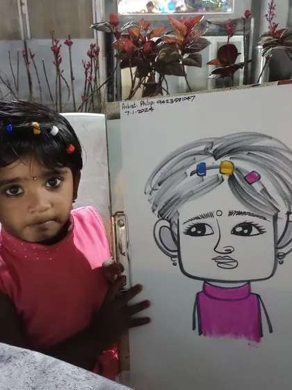 A very young guest with her cute caricature. I'm experienced in drawing children of all ages, even the little ones.