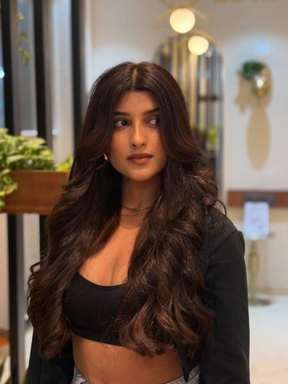 A gorgeous final look. This rich brunette shade is a perfect example of a global color that is both striking and sophisticated.