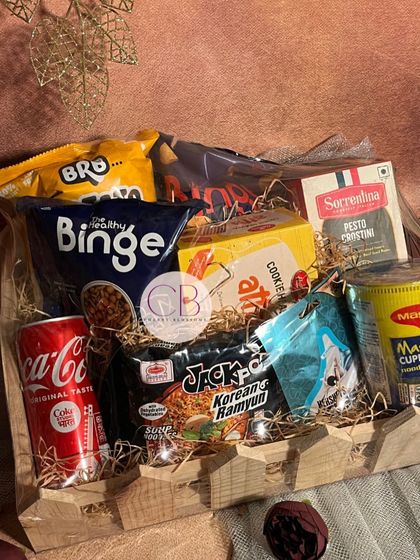 Watch out for our exclusive range of Diwali gift hampers. This one is a foodie's dream, packed with Korean ramen, Pesto, Maggi, Coca-Cola, and a variety of other delicious snacks.