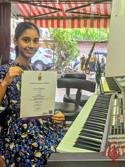 A huge round of applause for Marisca Castellino, who cleared her Grade 6 Keyboard exam with a phenomenal score of 92. This certificate represents countless hours of practice, scales, and dedication.