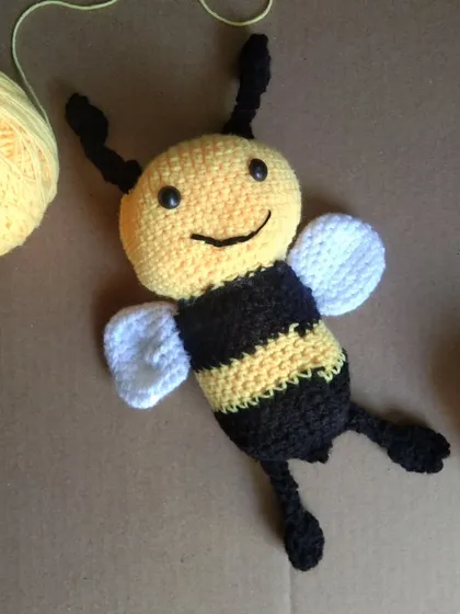 A closer look at the mommy bee amigurumi toy. I make sure each one has a friendly, smiling face and soft wings, perfect for little hands.