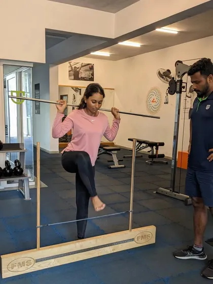 A Functional Movement Screen (FMS) assessment in progress. This helps us identify asymmetries and limitations in an athlete's movement patterns, allowing us to prescribe corrective exercises.