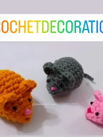 A trio of colorful crochet mice. These small amigurumi toys are great as party favors, small gifts for kids, or even as cute playthings for pets.