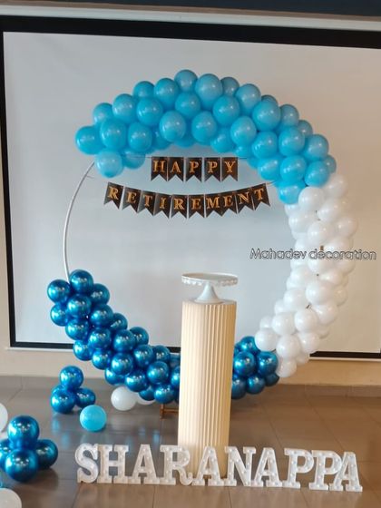 Celebrations aren't just for birthdays. I created this clean and simple 'Happy Retirement' backdrop with a blue and white balloon ring to honor a special career milestone.