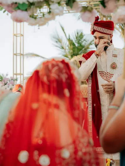 For me, wedding photography is about capturing real feelings. This powerful, unposed shot of the groom's emotional reaction as he sees his bride is a moment frozen in time.