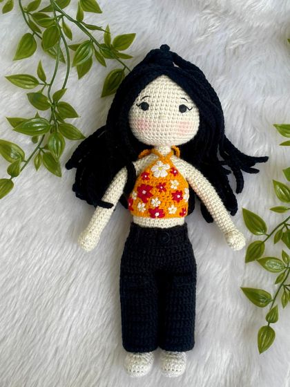 This replica doll features beautiful braided hair and a floral halter top. The customer requested no mouth for a unique, stylized look, which I think turned out so sweet and artistic.