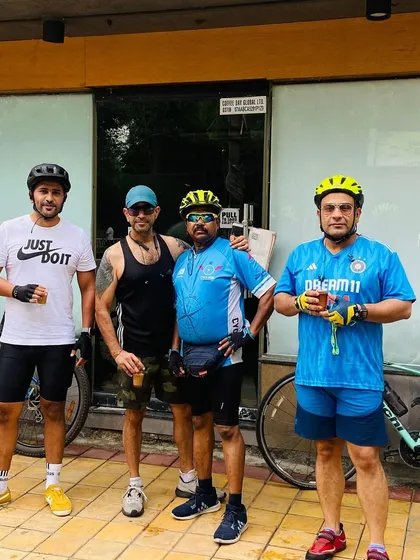 The crew enjoying a post-ride beverage. These moments of relaxation and conversation are an essential part of our rides.