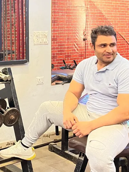 Taking a moment to relax in the gym. It's not just about lifting; it's about the lifestyle.