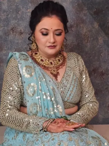 My beautiful and favorite client who gives me all the chances to dress her up. She looks absolutely regal in this custom blue and gold lehenga.
