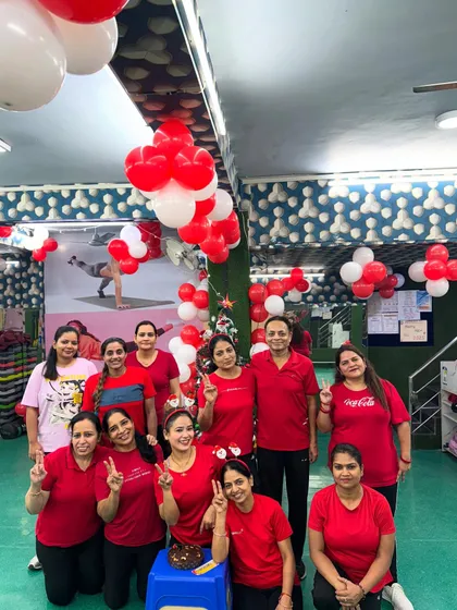 Our studio is our happy place, especially when it's decorated for Christmas. A group photo with our wonderful members.