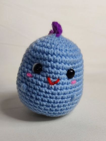 My tiny dino keychains are a handful of cuteness. They come in four different colors: blue, yellow, green, and grey.