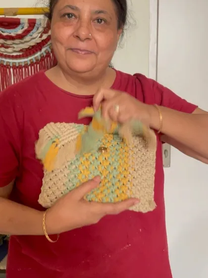 This multi-colored macrame bag shows how you can play with different shades. The optional lining ensures that even small items like safety pins stay secure inside.