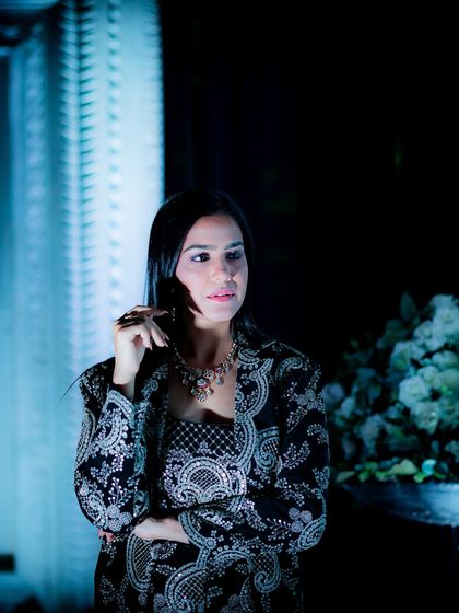 A stylish black and white printed co-ord set with a matching jacket, perfect for a modern sangeet or cocktail party.